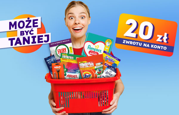 Czerwony koszyk wypełniony różnymi produktami, takimi jak środki czystości i pieluchy, z wyraźnie widocznymi etykietami. W tle znajdują się dwa napisy: Może być taniej oraz: 20 zł zwrotu na konto.