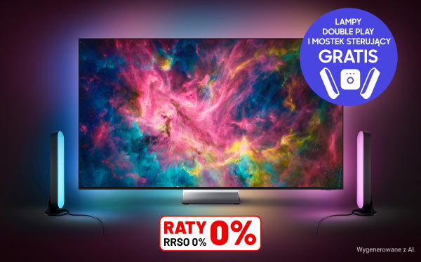 Duży ekran telewizora wyświetla kolorową, abstrakcyjną grafikę z dominującymi odcieniami różu, niebieskiego i żółtego, a po obu jego stronach znajdują się pionowe lampy emitujące kolorowe światło. W prawym górnym rogu znajduje się niebieskie koło z napisem Lampy Double Play i mostek sterujący gratis, a na dole widnieje napis Raty 0% RRSO 0%.