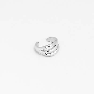 Adjustable sterling-silver open ring with layered wave design on white background, minimalist jewellery and modern stackable style
