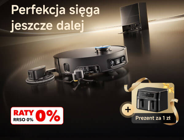 Okrągły robot sprzątający z widocznymi sensorami i akcesoriami na ciemnej, błyszczącej powierzchni, w tle stacja dokująca. W lewym górnym rogu napis Perfekcja sięga jeszcze dalej, a w dolnym lewym rogu czerwony prostokąt z napisem RATY 0%, RRSO 0%; w prawym dolnym rogu grafika z urządzeniem kuchennym i napisem Prezent za 1 zł.